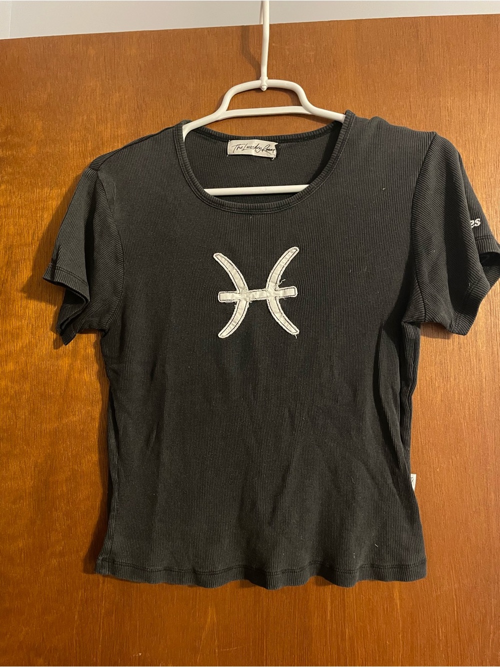 The Laundry Room Black Ribbed Tee with White Pisces Patch